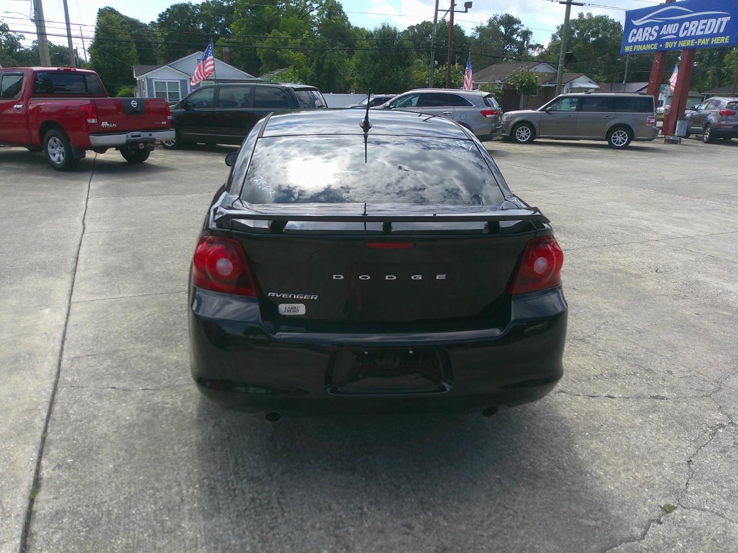 2013 BLACK DODGE AVENGER SE (1C3CDZAG5DN) , located at 1200 Cassat Avenue, Jacksonville, FL, 32205, (904) 695-1885, 30.302404, -81.731033 - Photo#3